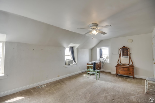 additional living space with ceiling fan, baseboards, visible vents, and carpet floors