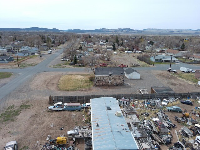 bird's eye view featuring a residential view and a mountain view