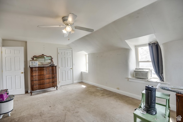 bonus room with baseboards, visible vents, lofted ceiling, carpet, and ceiling fan