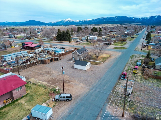 drone / aerial view featuring a mountain view