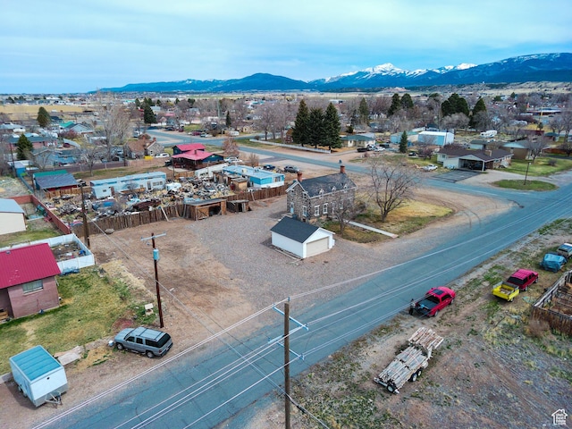 drone / aerial view featuring a mountain view
