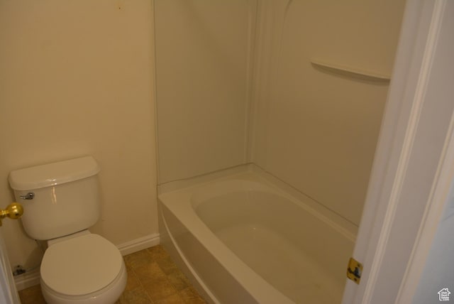 1617 W Treille Ct Unit I-5, West Valley City, UT 84119 - bathroom with a tub to relax in, walk in shower, toilet, and baseboards