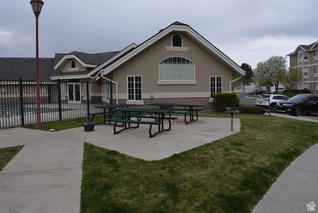 1617 W Treille Ct Unit I-5, West Valley City, UT 84119 - view of home's community featuring fence and a yard