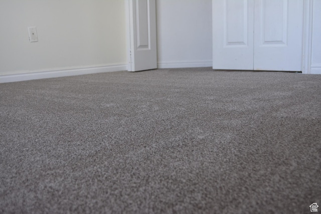 1617 W Treille Ct Unit I-5, West Valley City, UT 84119 - unfurnished bedroom featuring carpet floors and baseboards