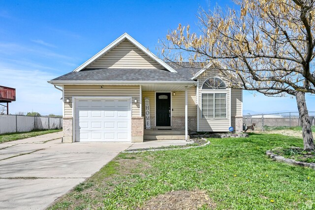 single story home with roof with shingles, driveway, a front yard, a garage, and fence