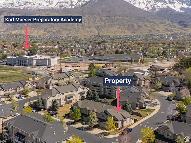 bird's eye view with a mountain view and a residential view