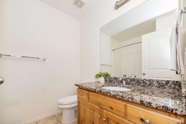 full bath featuring vanity, baseboards, tile patterned floors, toilet, and visible vents
