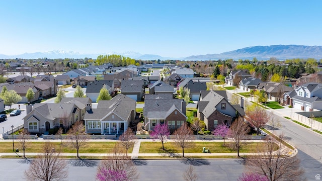 aerial view featuring a mountain view and a residential view