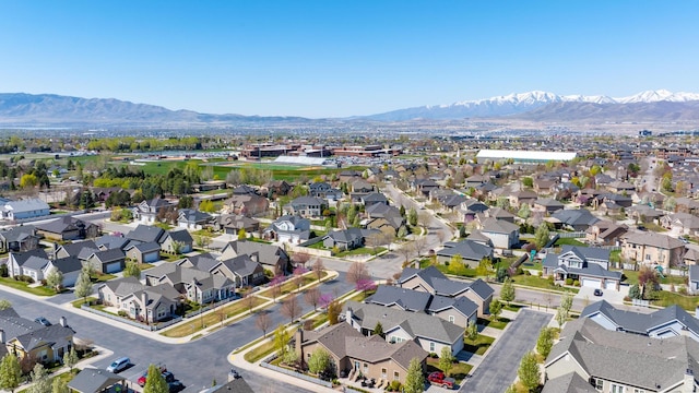 bird's eye view featuring a residential view and a mountain view