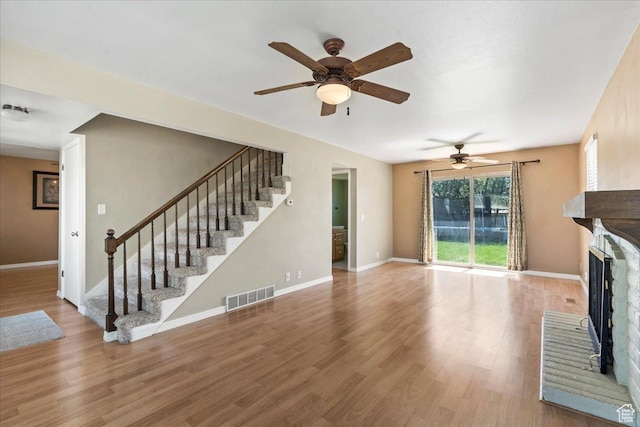 282 E 9545 S, Sandy, UT 84070 - unfurnished living room featuring stairs, visible vents, and a ceiling fan