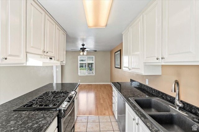 282 E 9545 S, Sandy, UT 84070 - kitchen featuring a sink, white cabinetry, under cabinet range hood, and stainless steel appliances