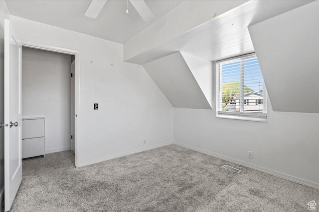 282 E 9545 S, Sandy, UT 84070 - additional living space featuring visible vents, baseboards, ceiling fan, carpet floors, and vaulted ceiling