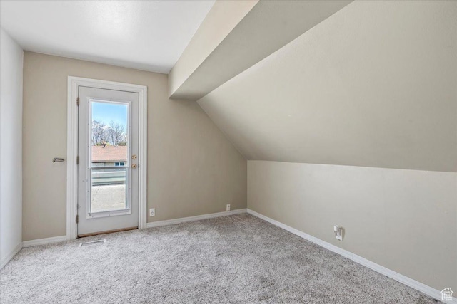 282 E 9545 S, Sandy, UT 84070 - additional living space with visible vents, carpet floors, baseboards, and vaulted ceiling