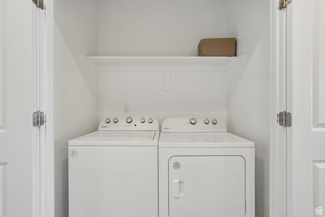 laundry room featuring laundry area and washing machine and dryer