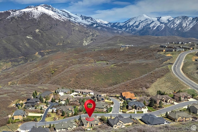aerial view with a mountain view and a residential view