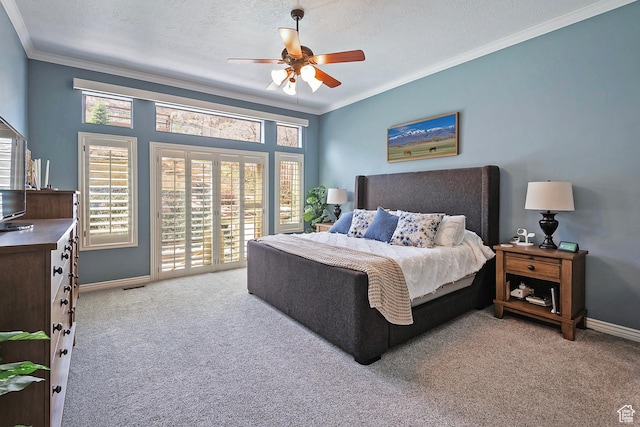 carpeted bedroom featuring crown molding, baseboards, access to outside, and a ceiling fan