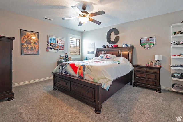 bedroom with visible vents, baseboards, ceiling fan, carpet, and a textured ceiling