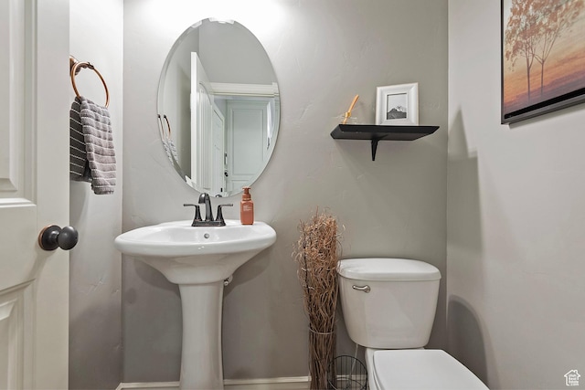 bathroom featuring toilet