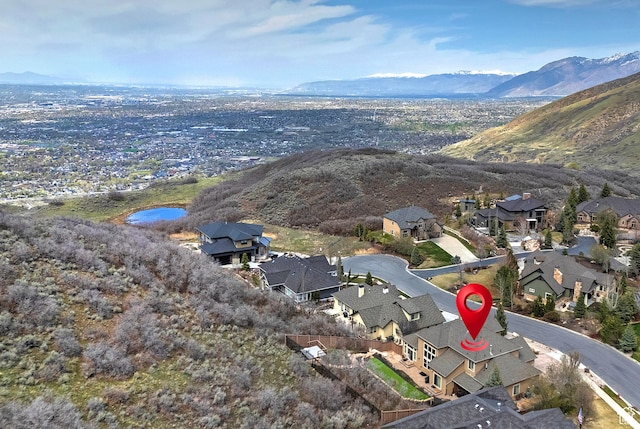 aerial view with a residential view and a mountain view