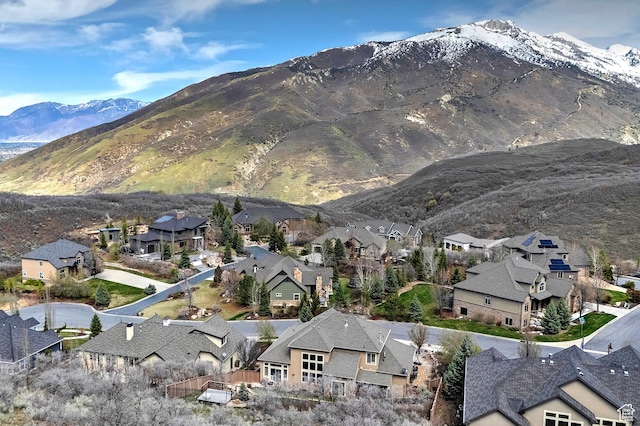 property view of mountains featuring a residential view