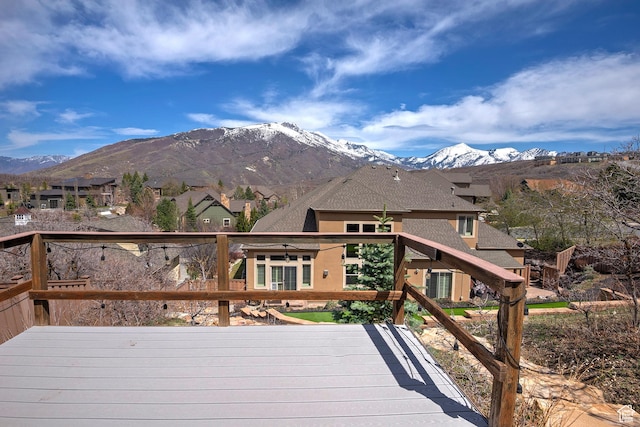 wooden terrace featuring a mountain view