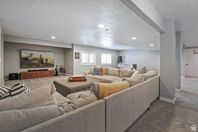carpeted living room with baseboards, recessed lighting, and a textured ceiling