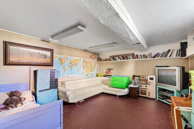 interior space featuring finished concrete floors and a textured ceiling