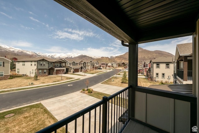balcony with a mountain view and a residential view