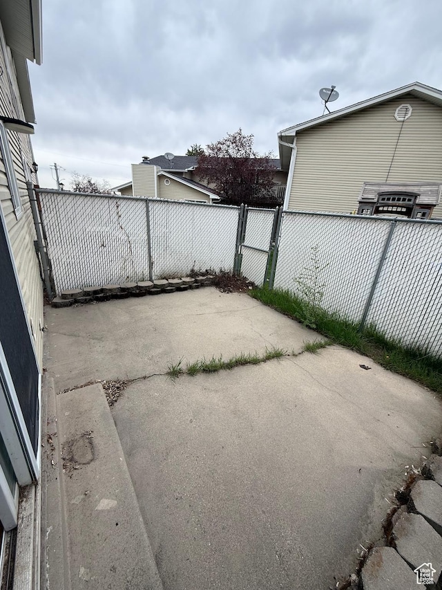 3049 S Orchard Dr Unit B, Bountiful, UT 84010 - view of patio with fence and a gate