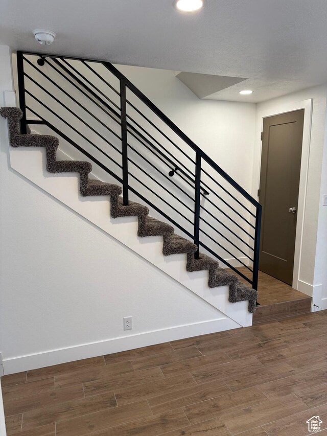 3049 S Orchard Dr Unit B, Bountiful, UT 84010 - stairs with recessed lighting, baseboards, and wood finished floors