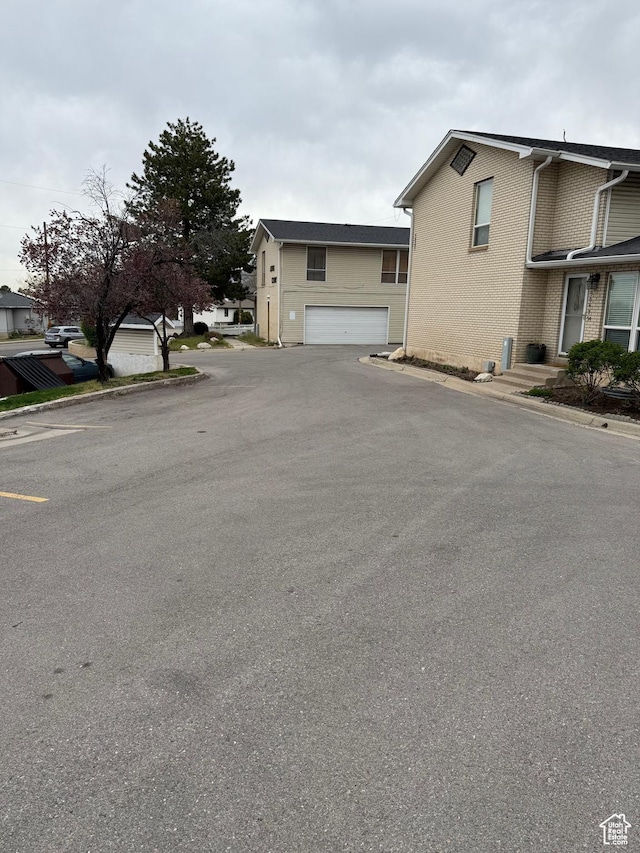 3049 S Orchard Dr Unit B, Bountiful, UT 84010 - exterior space with aphalt driveway and a garage