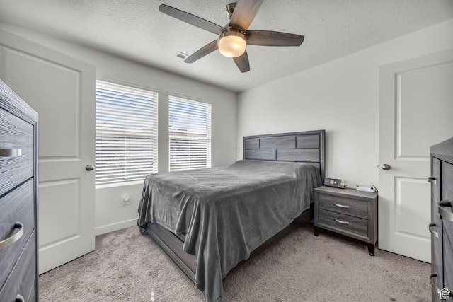 14843 S Beckenbauer Ave, Herriman, UT 84096 - bedroom with a textured ceiling, light colored carpet, baseboards, and a ceiling fan