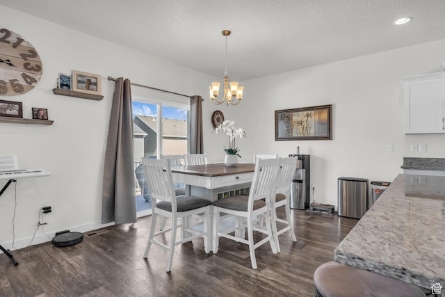 14843 S Beckenbauer Ave, Herriman, UT 84096 - dining space featuring dark wood-style flooring, baseboards, recessed lighting, and a chandelier