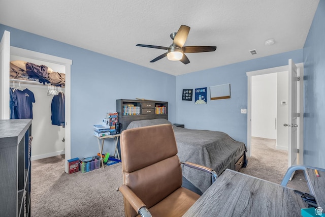 14843 S Beckenbauer Ave, Herriman, UT 84096 - bedroom featuring a closet, a spacious closet, carpet flooring, visible vents, and ceiling fan