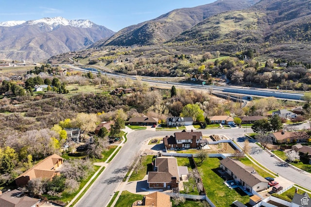 aerial view with a mountain view and a residential view