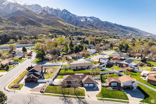 drone / aerial view featuring a mountain view and a residential view