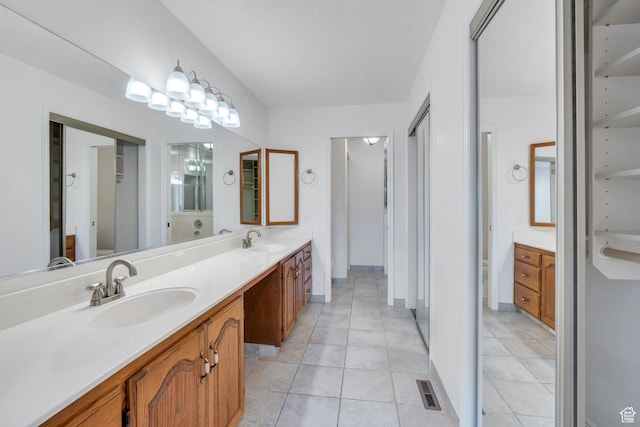 1769 Cobblestone Dr, Provo, UT 84604 - bathroom with double vanity and tile patterned floors