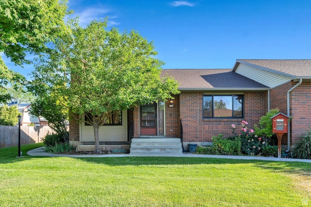 1769 Cobblestone Dr, Provo, UT 84604 - view of front of house featuring brick siding and roof with shingles
