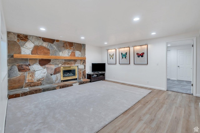 1769 Cobblestone Dr, Provo, UT 84604 - unfurnished living room featuring wood finished floors, recessed lighting, and a stone fireplace