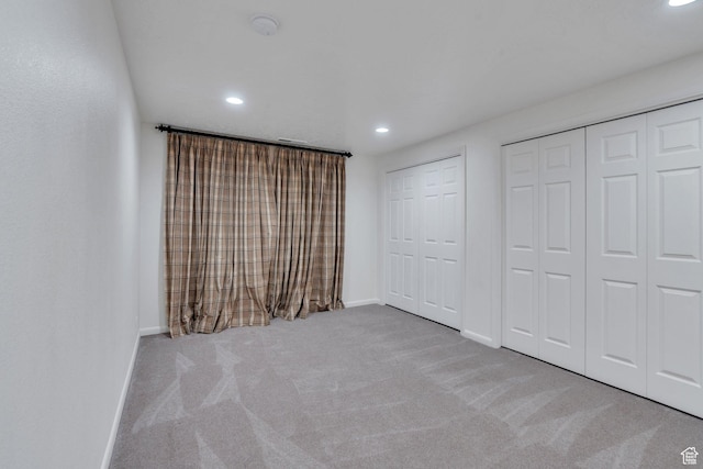 1769 Cobblestone Dr, Provo, UT 84604 - unfurnished bedroom with carpet flooring, two closets, and recessed lighting
