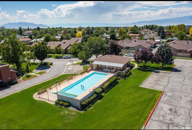 aerial view with a mountain view and a residential view
