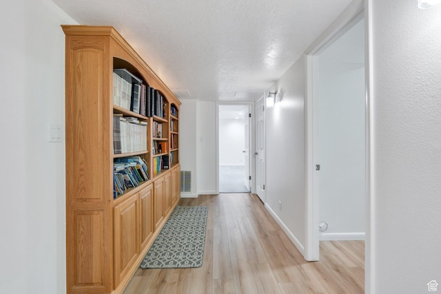 1769 Cobblestone Dr, Provo, UT 84604 - hall featuring light wood-style flooring and a textured ceiling