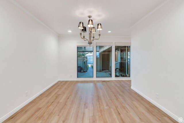 1769 Cobblestone Dr, Provo, UT 84604 - spare room featuring a chandelier, ornamental molding, wood finished floors, and recessed lighting