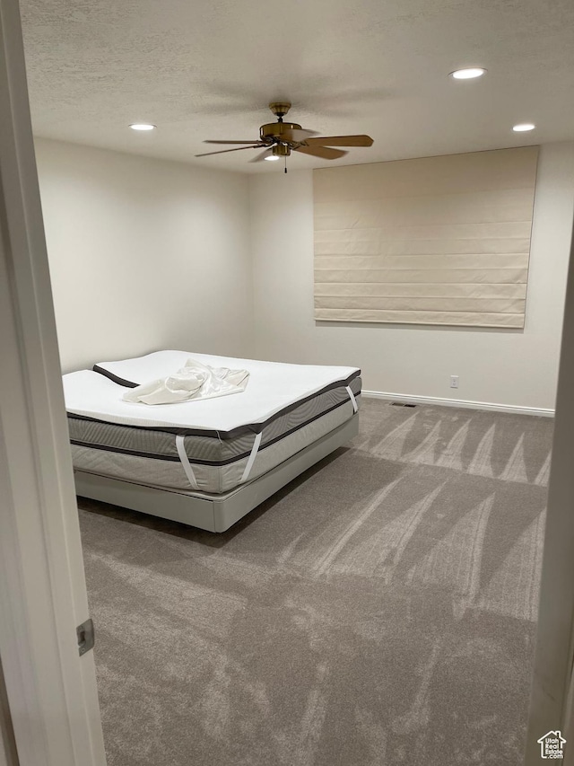 bedroom featuring ceiling fan, carpet flooring, baseboards, and recessed lighting