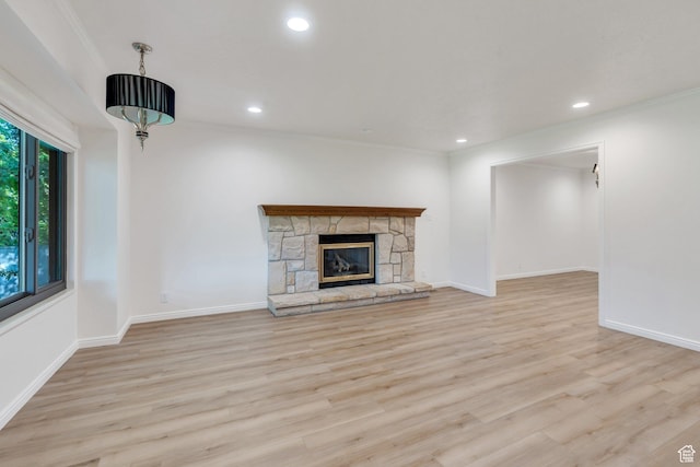 1769 Cobblestone Dr, Provo, UT 84604 - unfurnished living room featuring wood finished floors, ornamental molding, recessed lighting, and a fireplace