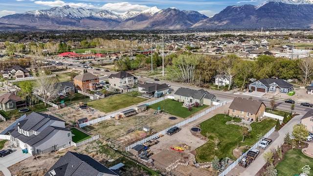drone / aerial view featuring a mountain view and a residential view