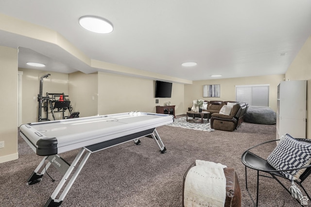 playroom featuring baseboards and carpet