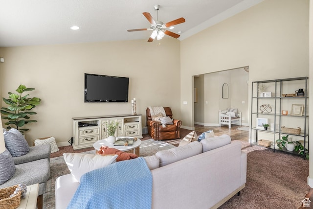 carpeted living area with high vaulted ceiling, baseboards, a ceiling fan, and recessed lighting