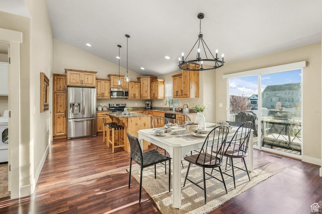 dining area with a chandelier, dark wood-type flooring, baseboards, and lofted ceiling