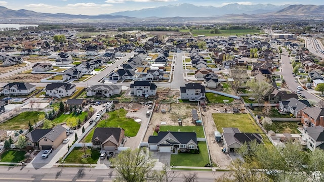 drone / aerial view featuring a mountain view and a residential view